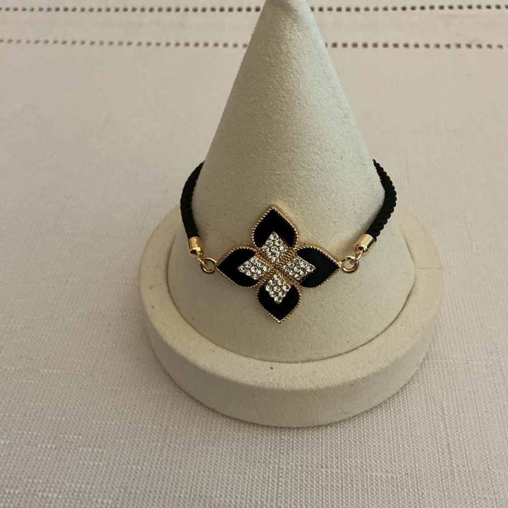 Black Rhinestone Gold Tone Bolo Bracelet